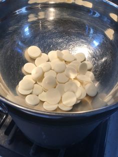 the food is being cooked in the pan on the stove top and ready to be put into the oven