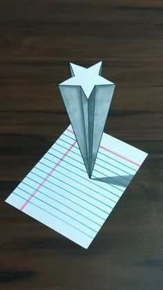 a piece of paper with an origami design on it