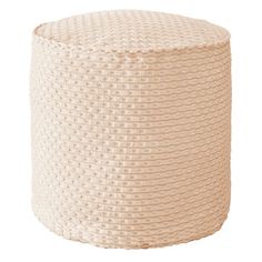 a large round poufce in beige