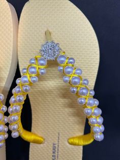 Perfect for your special day or just Walk at the beach with a pair of comfy & cute flip flops, great for pool and walks  Made with rhinestones and Pearls satin lace its super comfortable The pearls were sewing by hands using clear jewelry cord 0.40 mm Color yellow  Size 8 This is an Old Navy Flip Flops can be made with Havaianas but it would cost more! Can be made in different colors and sizes. Smoke and pet free Gold Rhinestone Flip Flops For Vacation, Elegant Gold Flip Flops For Beach, Elegant Gold Flip Flops For The Beach, Gold Elegant Adjustable Flip Flops, Yellow Open Toe Sandals With Rhinestones, Adjustable Rhinestone Flip Flops For The Beach, Adjustable Beaded Flip Flops For Party, Adjustable Rhinestone Toe Post Flip Flops, Elegant Gift Flip Flops