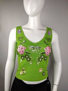 "Vintage Roccobarocco bright green tan top, ribbed stretchy cotton, front is embroidered with beads and sequins, rhinestones brand logo on the back. Size USA4 FR34 tag, fits XS-S (see the measurements) Condition 9/10 (good condition) Made in Italy Underarm to underarm - cm/\" Strapless front length - cm/\" All measurements taken with garment lying flat. Vintage sizes vary greatly! We recommend comparing measurements with a similar style garment you own for best fit! If you have any other questio Verde Vintage, Beaded Shirt, Tan Top, Green Tank Top, Ribbed Tank Top, Marken Logo, Beige Top, Green Tank, Y2k Vintage