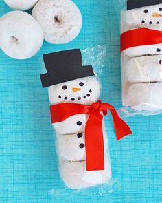 snowman marshmallows are wrapped in red ribbon