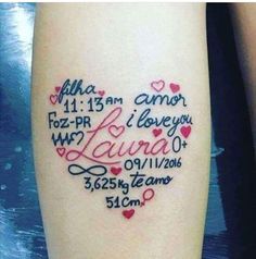 a heart shaped tattoo with the names of two people and their children on it's arm