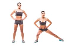 two women in sports bras and shorts posing for the camera with their hands on their hips