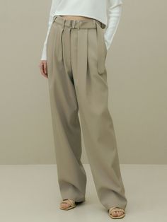 Editor's Notes The pants have a masculine, simple mood.  - Elegant, casual look- Polyester-spandex material to wear all year round- Unique belt designMeasurements(in.)S / M- Length: 41.93 in. / 42.32 in.- Waist: 14.57 in. / 15.55 in.- Front Rise: 13.98 in. / 14.37 in.- Back Rise: 17.52 in. / 17.91 in.- Thigh: 14.17 in. / 14.96 in.- Bottom Hem: 9.25 in. / 9.65 in. Model info: Height 5' 7.5'', Waist 24 in., Hip 35 in.Composition & Care- 96% Polyester, 4% Polyurethane- Classic Khaki Pants, Classic Full Length Khaki Pants, Classic Full-length Khaki Pants, Khaki Straight Dress Pants For Business Casual, Business Casual Khaki Pants With Belt Loops, Classic High-waisted Khaki Pants, Classic Khaki Bottoms For Fall, Classic Full-length Neutral Pants, Khaki High-waisted Pants For Business Casual