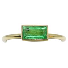 We have for you this stunning Emerald stacker ring made in 10kt Yellow gold. This ring is made here in Canada to exacting standards and is sure to turn heads and get your friends asking 'where did you get that?', be sure to tell them you got it at Skyjems. The ring is currently a size 6.5 and can be sized up to a size 9 or down to a size 3.5, please choose your size at checkout, sizing takes 2-3 business days. Details: Gem Type: Emerald Gem Weight: 0.41cts. Measurements: 6.31x3.30mm Shape: Bague Emerald Rings, Stacker Rings, Emerald Gem, Colombian Emeralds, Emerald Ring, Cocktail Rings, Got It, Ring Set, Ring Sets