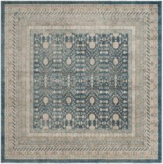 a blue and beige rug with an intricate design