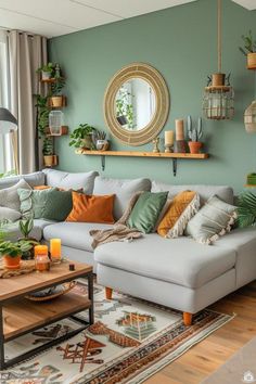 a living room filled with lots of furniture and plants on top of the couches