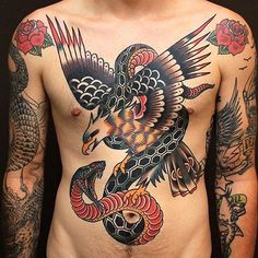 a man with an eagle and snake tattoo on his chest