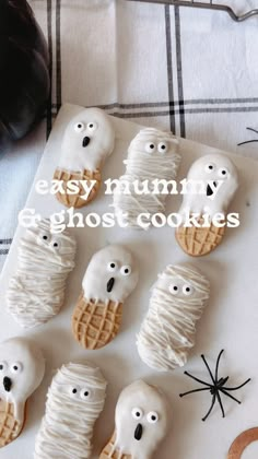 halloween cookies with white icing and spooky eyes