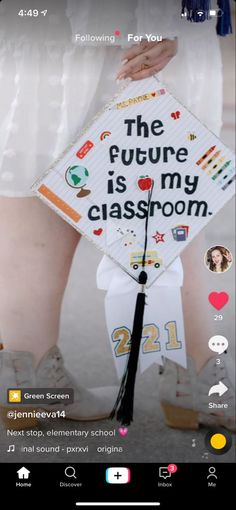 someone is holding a graduation cap that says the future is my classroom