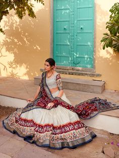 Introducing a captivating white and maroon tussar silk lehenga ensemble that effortlessly blends tradition with contemporary style. The lehenga, meticulously adorned with patola print work and foil detailing, is stitched to perfection, offering a comfortable fit for sizes up to 42 inches. Boasting a generous 3.80-meter flair and an elegant 42-inch length, this ensemble exudes grace and sophistication. Complementing the lehenga is a matching tussar silk choli, featuring the same enchanting patola Plain Lehenga, Patola Print, Silk Lehenga, Silk Dupatta, Printed Silk, Traditional Indian, Women's Wardrobe