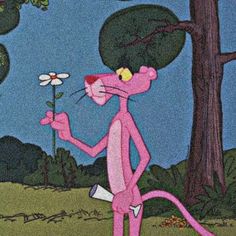 the pink cat is holding a flower in its hand