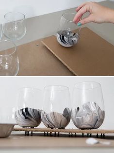 three different shots of marbled wine glasses