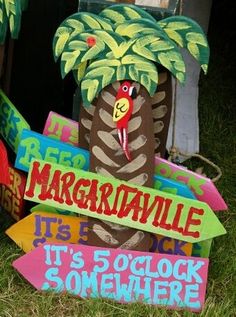 there is a sign that says margaritaville and it's 5 o clock somewhere