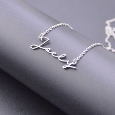 925 Silver name necklace,you can order any word-women's gift-handmade jewelry. ★ ★ ★ ★ ★Our jewelry made of 925 sterling silver with handmade. ★ ★ ★ ★ ★Orders need 3-5 business days to finished. ★ ★ ★ ★ ★ 100% SATISFACTION!Give FULL refund if you do not love it. I can make the bar necklace with name,dates, letters, monogrammed initials, words, roman numerals or other combination of text and characters. The item will come with a gift box,ready to be gifted. ITEM DETAILS： Material: Sterling Silver Necklace With Name, Silver Name Necklace, Not Love, Rose Gold Pendant, Gift Handmade, Roman Numerals, Monogram Initials, Bar Necklace, Name Necklace