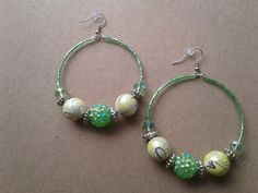 Green and yellow beaded hoop earrings...made using a swirl bead mix, green rondelle beads, green bugle beads, and yellow seed beads.  There's 3 pairs included in this listing...2 green pairs and 1 yellow pair. Please be sure to select which color you would like when you order.  I also want to point out that these pictures barely does these earrings justice...especially the green pairs! They're much more shiny, vibrant, and green in person! Trust me, they are very pretty :-) They're 3 inches in l Green Beaded Earrings With Czech Glass, Handmade Green Beaded Hoop Earrings, Green Czech Glass Beaded Earrings, Green Hoop Beaded Earrings With Dangling Beads, Yellow Earrings With Large Round Beads, Green Beaded Small Hoop Earrings, Green Beaded Dangle Hoop Earrings, Handmade Green Beaded Earrings With Czech Glass, Green Beaded Hoop Earrings For Gift