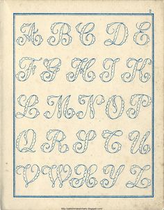 an old book with the letters and numbers drawn on it's cover, in blue ink