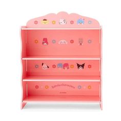 a pink children's book shelf with stickers on the top and bottom shelves