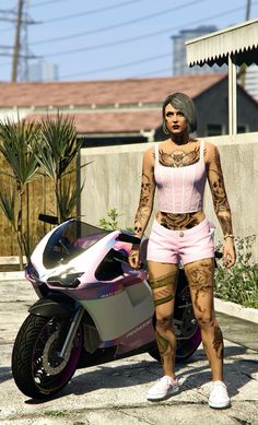 a woman with tattoos standing next to a pink and white motorbike in the street