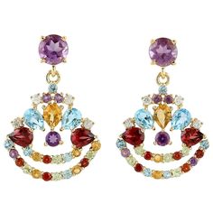 Cast from 18K gold, these multi gemstone earrings are hand set with .47 carats Citrine, 1.41 carats Amethyst, 1.27 carats garnet and .13 carats of diamonds. FOLLOW MEGHNA JEWELS storefront to view the latest collection & exclusive pieces. Meghna Jewels is proudly rated as a Top Seller on 1stDibs with 5 star customer reviews. All items manufactured by us are handmade and can be customized or redesigned. Composition Size-25X16 MM Total Weight-5.391 Gold Weight(Gms)-4.521 Diamond Wt(Cts)-0.13 Ameth Queen Earrings, Earring Fashion, Diamond Collection, Rainbow Jewelry, Long Dangle Earrings, Jewelry Show, Girly Jewelry, Gift Jewelry, Top Seller