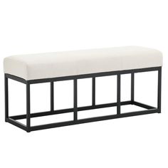 a black and white bench with a cushion on it