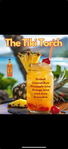 the tiki torch cocktail recipe book is shown with pineapples and cherries