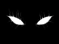 the eyes of an evil looking cat are glowing in the dark with long white lashes