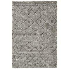 a gray rug with diamonds on it