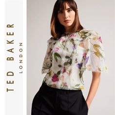 Ted Baker Arelln Floral High Neck Top With Lace Details Size 0 New With Tag. Please See Pictures For Appropriate Measurements Laying Flat. Pit To Pit-15.5” Full Length-21.5” Details & Care Charming Flutter Sleeves And Lace Trim Frame This Flowery Mesh Top That's Full Of Desk-To-Dinner Polish. High Neck Jewel Neck Short Sleeves Flutter Sleeves Back Button Closure With Keyhole Lace Trim Throughout Allover Floral Print Lined Made In Portugal Material & Care Shell: 95% Polyester/5% Elastane; Lining: Lace Tape, Ruffle Bell Sleeve, Sleeveless Knit Top, Womens Sleeveless Tops, Printed Sleeveless Top, High Neck Top, Floral Print Blouses, Floral Print Shorts, Blouse White