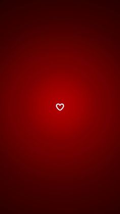 a red background with a white heart in the middle