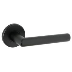 a black door handle on a white wall