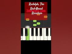 a red and black piano with the words rudolph, the red - nosed reindeer on it