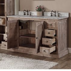 a bathroom vanity with two sinks and drawers