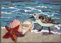 two seagulls and one starfish on the beach