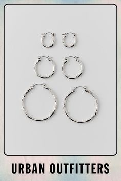 Hammered hoop earring set with three pairs of earrings. Features Hammered hoop hoop earring set Set of three pairs of earrings Content + Care Includes 3 pairs Mixed metals Wipe clean Imported | Hammered Hoop Earring Set in Silver, Women's at Urban Outfitters Elegant Everyday Jewelry By Urban Outfitters, Elegant Everyday Jewelry From Urban Outfitters, Urban Outfitters Hoop Jewelry, Hoop Earring Set, Hammered Hoop Earrings, Hoop Earring Sets, Mixed Metals, Earring Set, Urban Outfitters