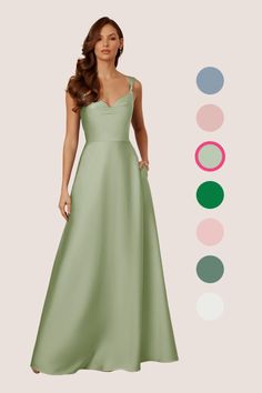 a woman in a long green dress with different colors