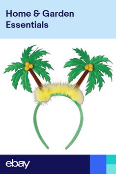 a green headband with two palm trees on it and the words home & garden essentials