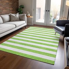 a green and white striped rug in a living room