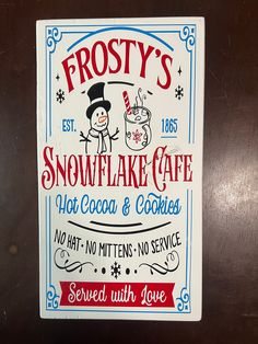 frosty sign for frosty's snowflake cafe, hot cocoa and cookies