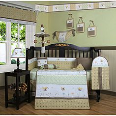 a baby crib bedding set in a room