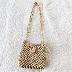 Super Cute Sea Shell Bag! Never Used All Shells Are Attached Pictured With My Hand For Sizing Rock A One Of A Kind Bag This Summer! I’m 5’4’’ And When Wearing This Bag Falls Right At My Hip *Not Urban Outfitters, Private Boutique* Urban Outfitters Travel Bags For Summer, Urban Outfitters Summer Travel Bags, Urban Outfitters Rectangular Shoulder Bag For Summer, Urban Outfitters Summer Bag For Everyday Use, Gold Crossbody Bag For Beach, Gold Crossbody Straw Bag For Everyday, Trendy Rectangular Bag By Urban Outfitters, Trendy Rectangular Bags By Urban Outfitters, Gold Crossbody Straw Bag