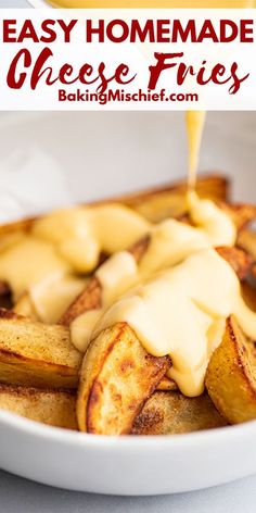 homemade cheese fries in a white bowl with sauce being drizzled over them