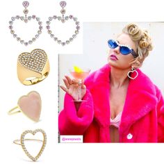 a woman in pink jacket holding a drink and two heart shaped rings next to other jewelry items