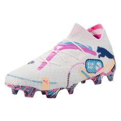 a white soccer shoe with pink, blue and yellow designs on the upper part of it