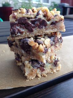 three pieces of chocolate chip bars stacked on top of each other