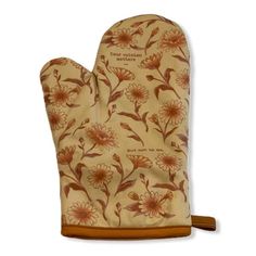 an oven mitt with flowers on the front and side, in brown leather trim