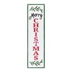 a merry christmas sign hanging from the side of a white wall with green and red trim