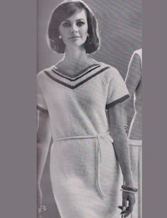 an old photo of a woman in a sailor's dress