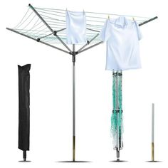 three different types of clothes drying on an ironing board and two umbrellas with poles